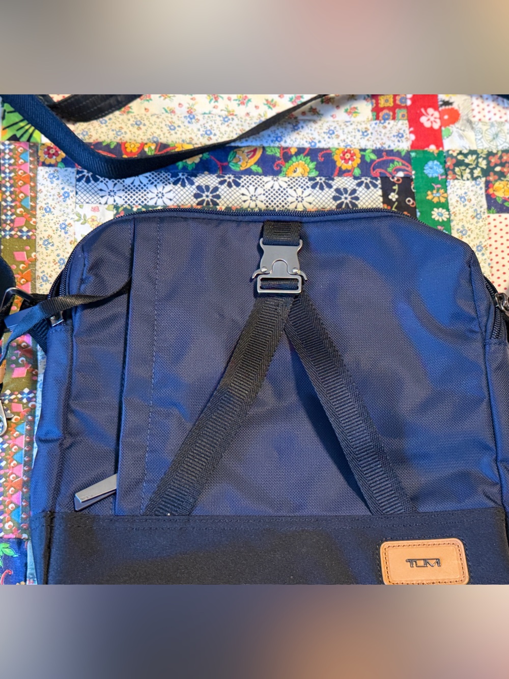 Tumi Navy Blue Messenger Crossbody Bag with Black Strap and Tan Logo Patch